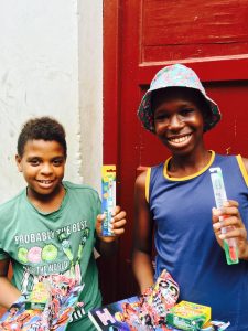 Young cubans happy with their new toothbrushes